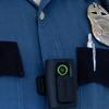 Some police are now using wearable cameras to record interactions with the public. The one shown here was made by a company called Vievu.
